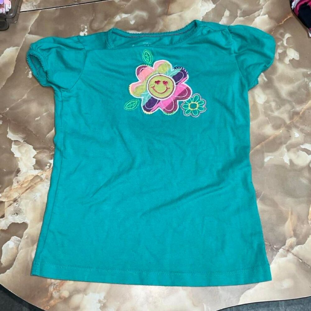 Faded Glory teal tee with flower graphic, size 6